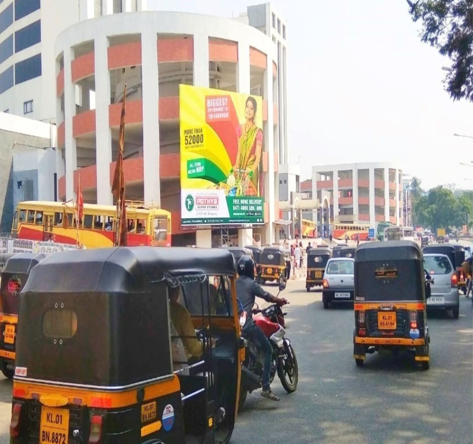 Thambanoor Hoarding rate list, Town – Thiruvananthapuram, Location – Thambanoor, Size – 25 x 25 ft, Lit/Non Lit, Rate per month – Rs. 75,000, Rate for 6 Months – Rs. 4,12,500, Rate for 1 Year –  Rs. 7,50,000